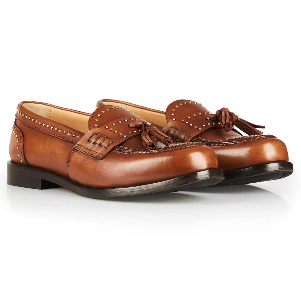 Mocassino penny con borchie e nappe