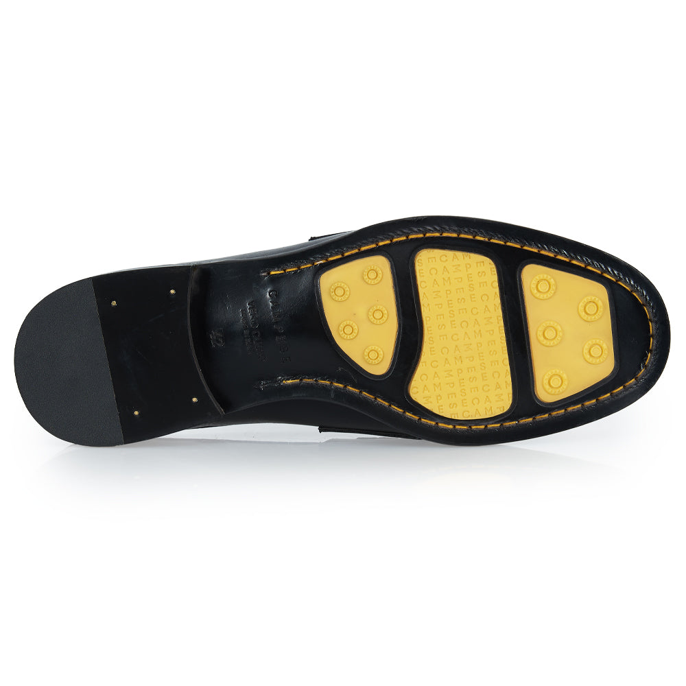 Slingback nero con nappine
