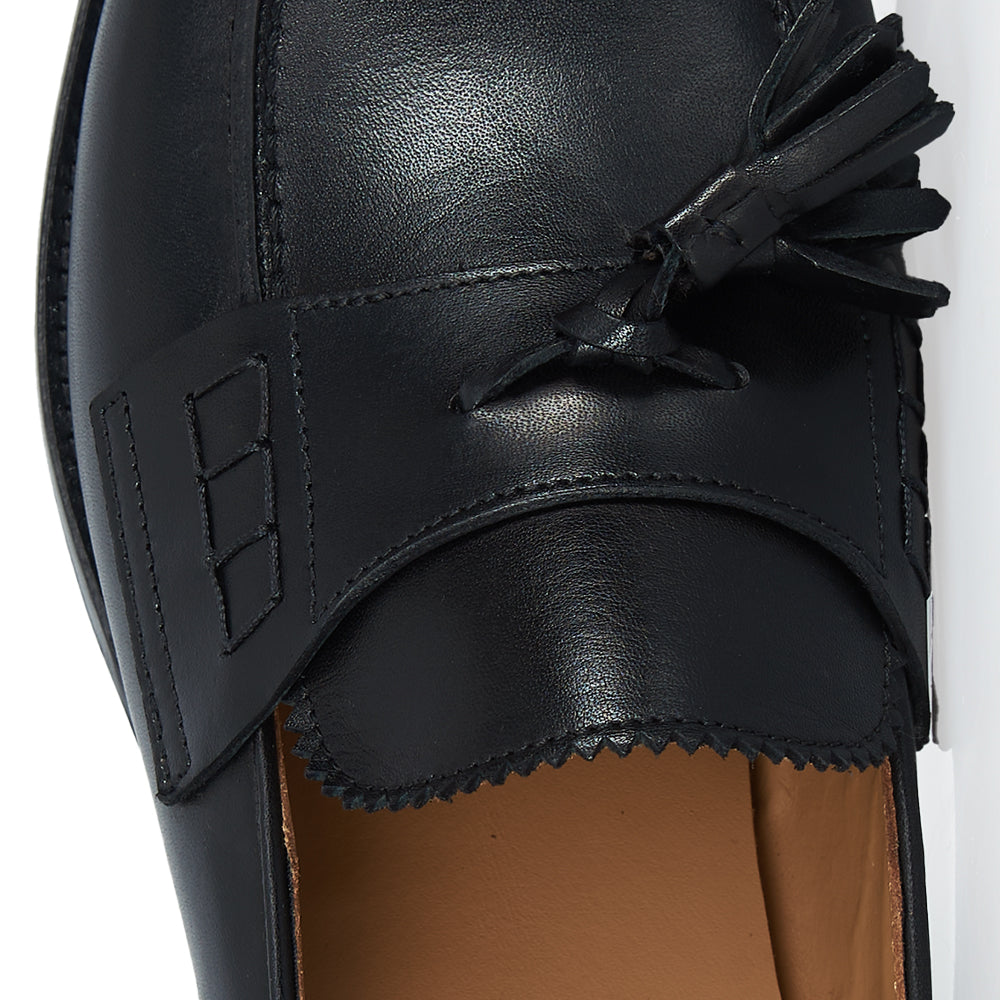 Slingback nero con nappine