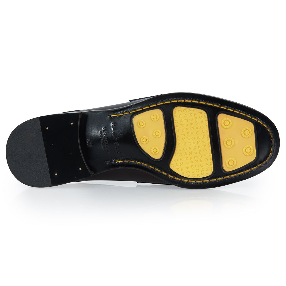 Slingback testa di moro con nappine