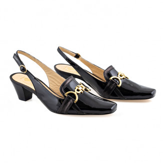Mules in strap with golden buckle in smooth black patent leather