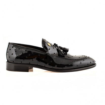 Loafers in perforated black patent leather