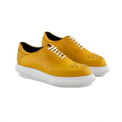 Sneakers in pelle gialla
