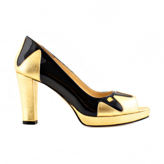 Courts in gold/black leather
