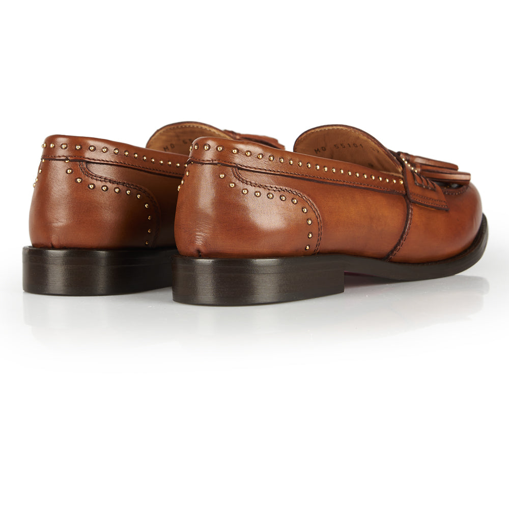 Mocassino penny con borchie e nappe