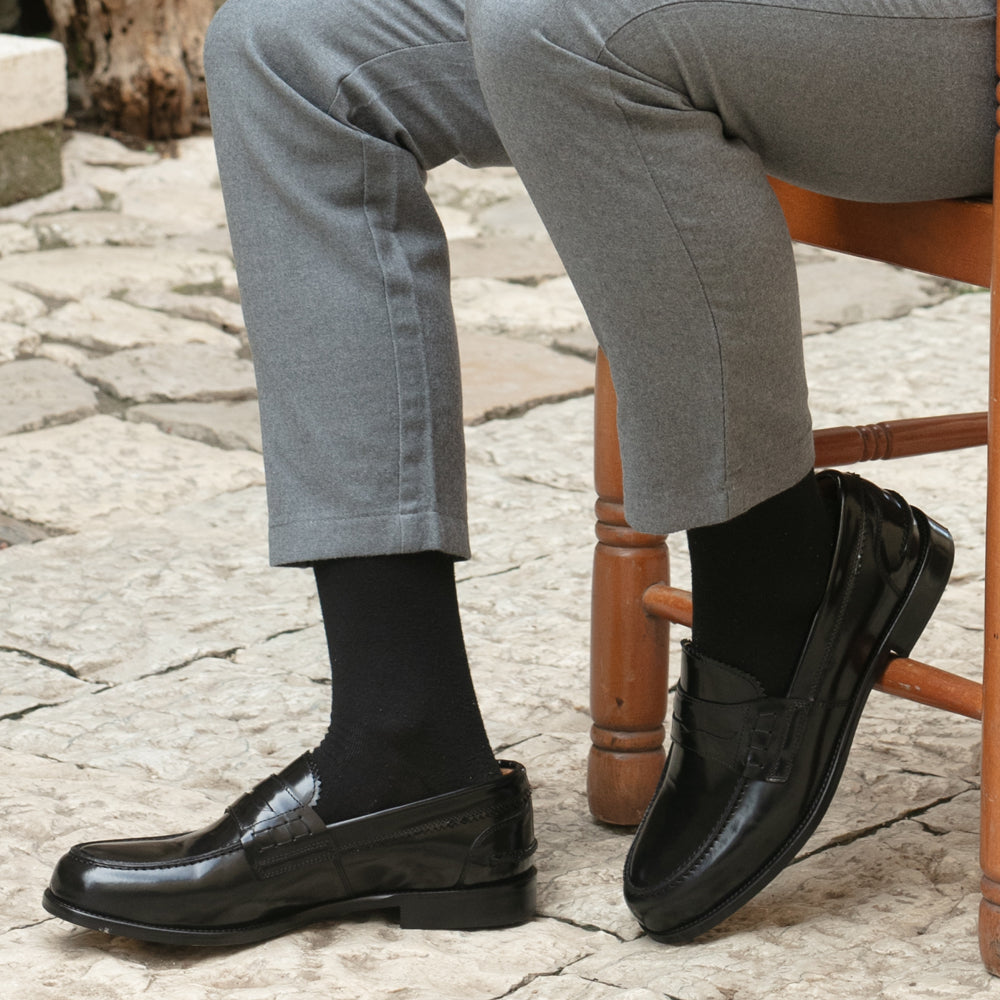 Mocassino Penny in pelle nera abrasivata