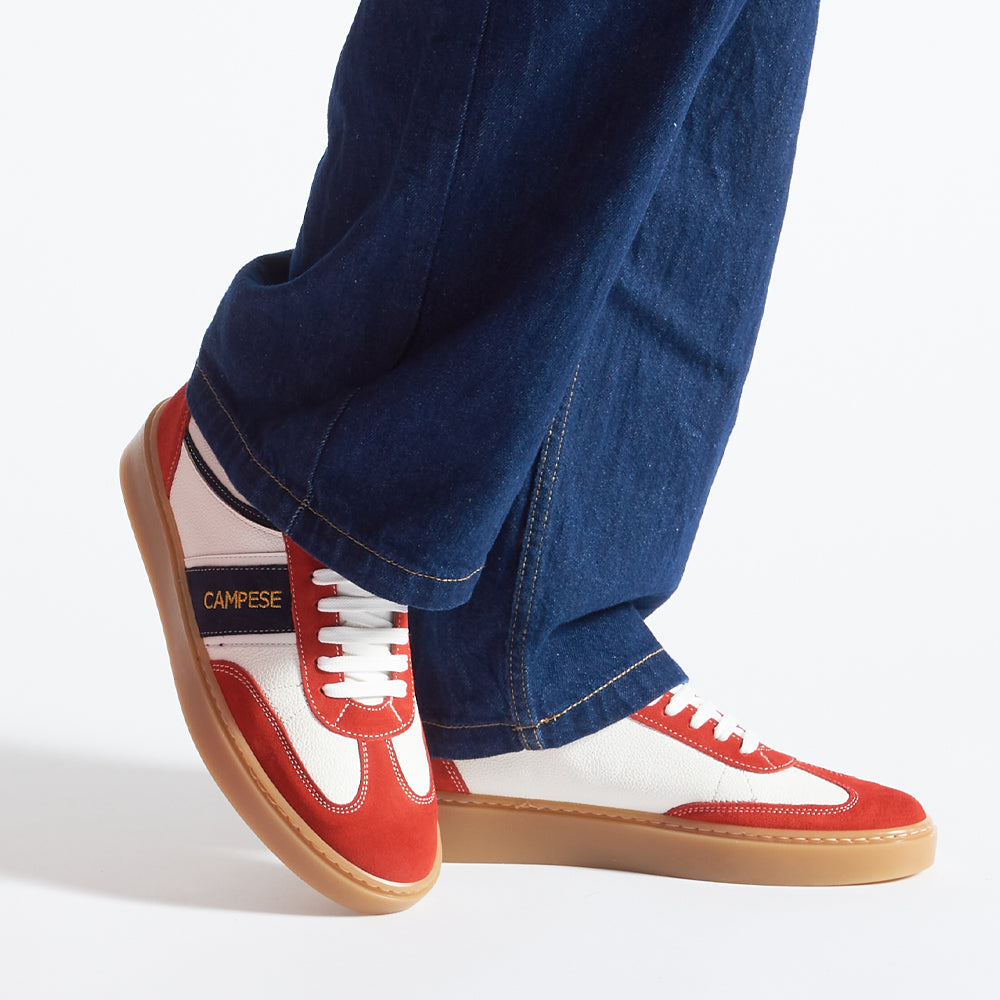 White leather and red suede sneakers