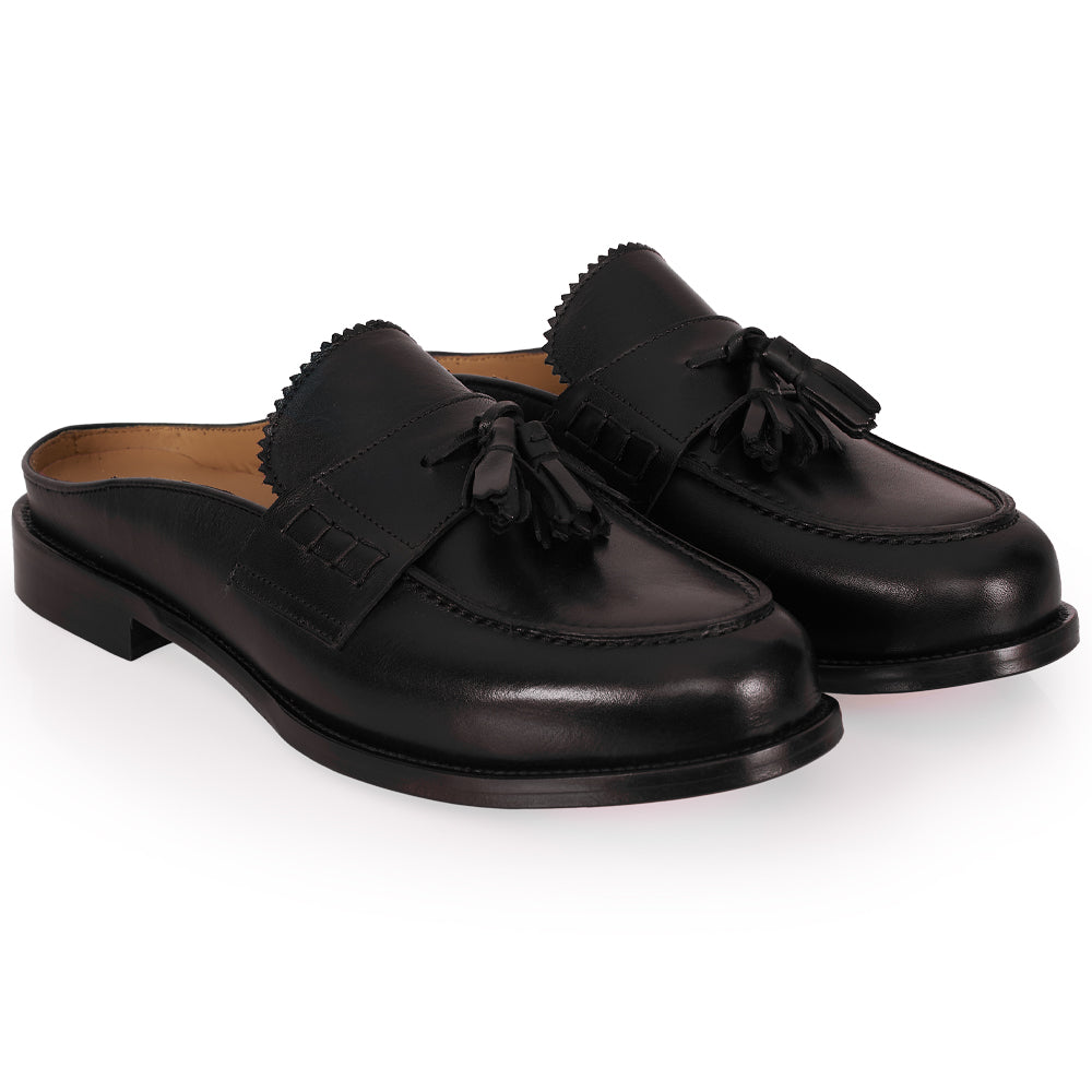 Slingback testa di moro con nappine
